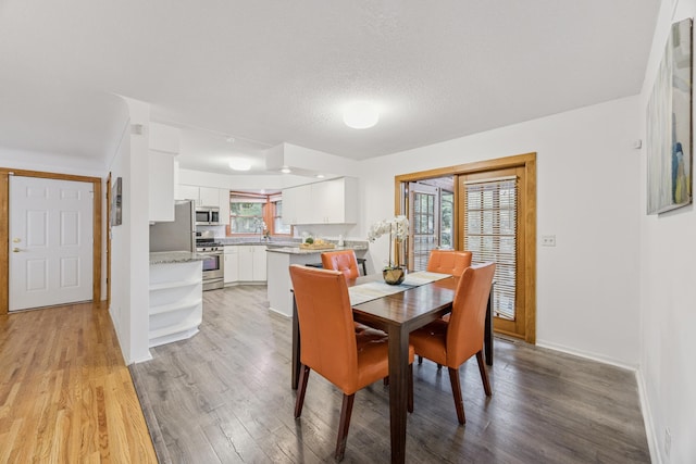 3916 Thomas Ave S, Minneapolis, MN 55410 - dining room with light wood-style floors