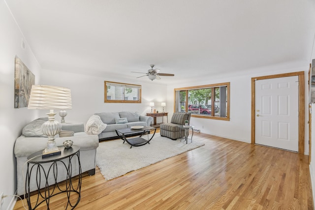 3916 Thomas Ave S, Minneapolis, MN 55410 - living area with a ceiling fan and wood finished floors