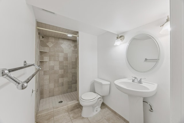 3916 Thomas Ave S, Minneapolis, MN 55410 - bathroom featuring a tile shower and tile patterned flooring