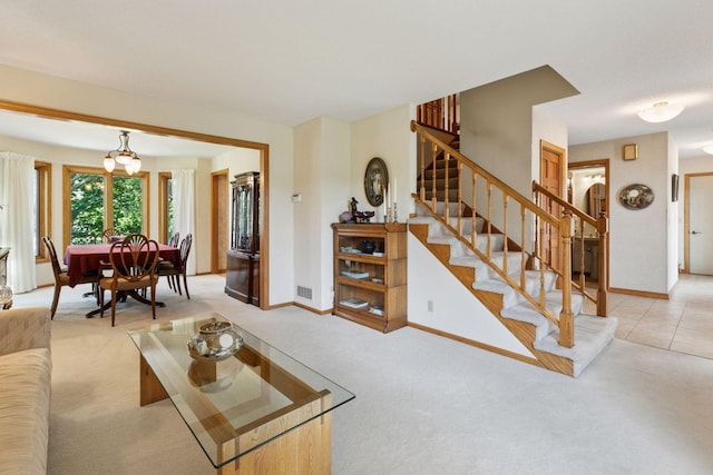 1890 Partridge Cir, Chanhassen, MN 55331 - living room featuring light colored carpet and stairs