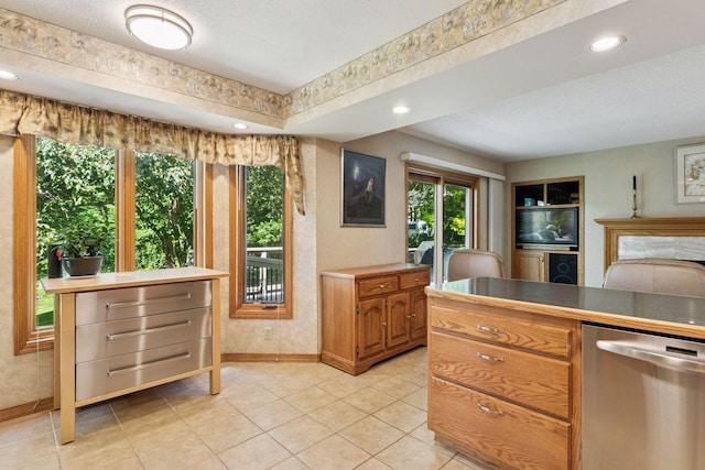 1890 Partridge Cir, Chanhassen, MN 55331 - kitchen with stainless steel dishwasher, light tile patterned floors, brown cabinets, and recessed lighting