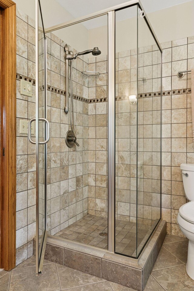 1890 Partridge Cir, Chanhassen, MN 55331 - full bath featuring a shower stall and tile patterned flooring