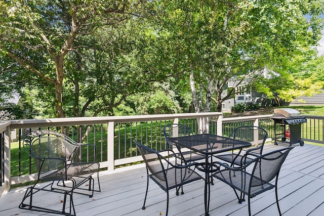1890 Partridge Cir, Chanhassen, MN 55331 - wooden terrace with outdoor dining area and area for grilling