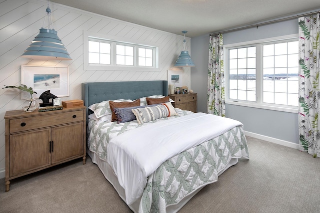 1251 149th St W, Rosemount, MN 55068 - bedroom featuring light carpet, multiple windows, and wood walls