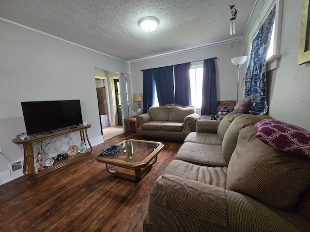 108 9th St, Morris, MN 56267 - living area with a textured ceiling, crown molding, and wood finished floors