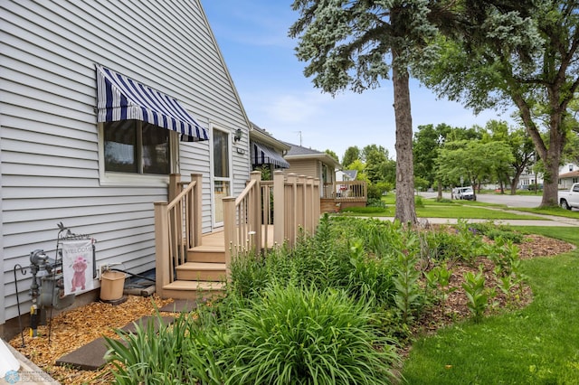 1109 14th St N, Moorhead, MN 56560 - view of home's exterior with a deck