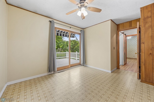 1109 14th St N, Moorhead, MN 56560 - empty room with light flooring, ceiling fan, crown molding, and a textured ceiling