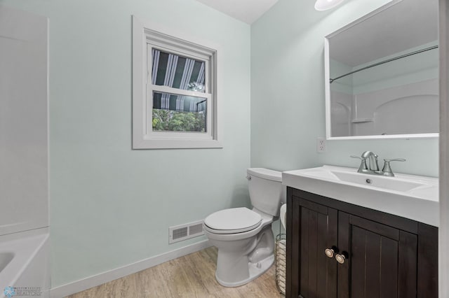 1109 14th St N, Moorhead, MN 56560 - full bath featuring wood finished floors and vanity