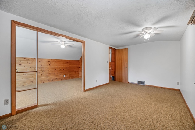 1109 14th St N, Moorhead, MN 56560 - carpeted empty room featuring ceiling fan and a textured ceiling