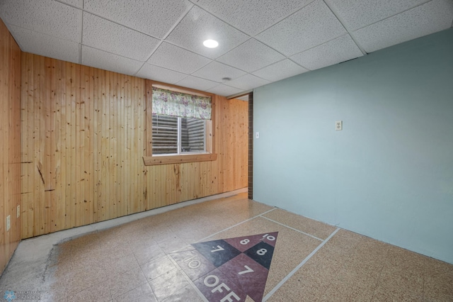 1109 14th St N, Moorhead, MN 56560 - unfurnished room featuring wooden walls and recessed lighting