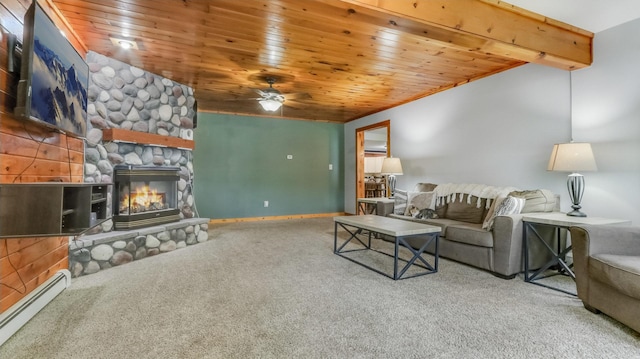 14645 Chapel Rd, Edgewater, WI 54817 - carpeted living room with a baseboard heating unit, a ceiling fan, wood ceiling, lofted ceiling, and a stone fireplace