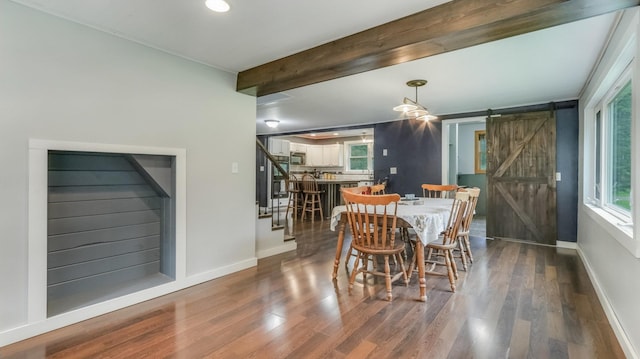 14645 Chapel Rd, Edgewater, WI 54817 - dining area featuring a barn door, wood finished floors, healthy amount of natural light, stairs, and beam ceiling