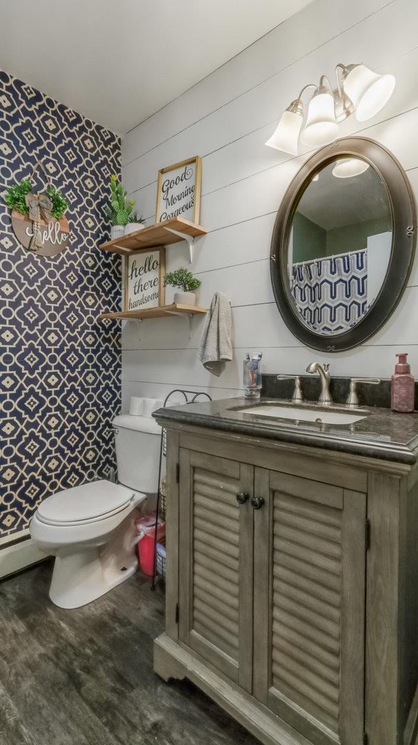 14645 Chapel Rd, Edgewater, WI 54817 - bathroom with wood finished floors and vanity