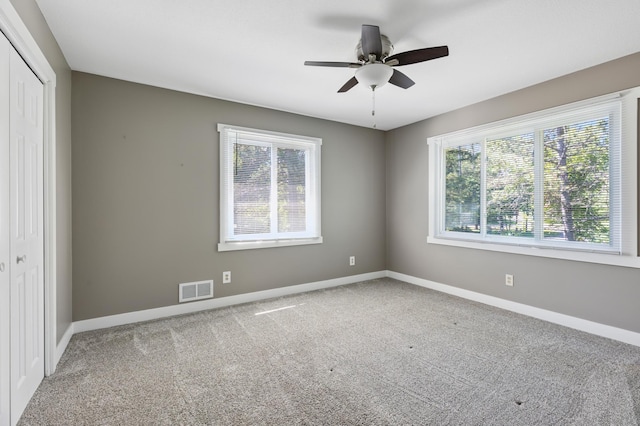 27088 130th St, Staples, MN 56479 - unfurnished room featuring healthy amount of natural light, carpet, and ceiling fan