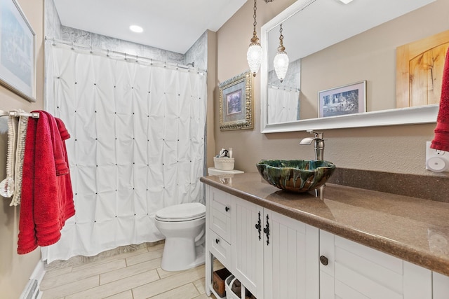 N5887 1110th St, Oak Grove Twp, WI 54021 - full bathroom featuring vanity, curtained shower, and wood finish floors