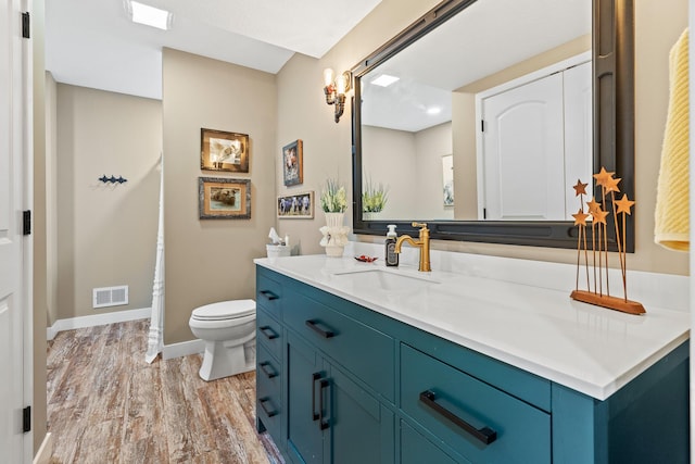 N5887 1110th St, Oak Grove Twp, WI 54021 - bathroom featuring vanity and wood finished floors