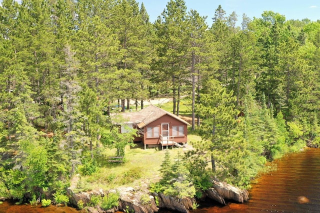 518 Sparrow Ln, Fall Lake Twp, MN 55731 - view of subject property with a large body of water and a heavily wooded area
