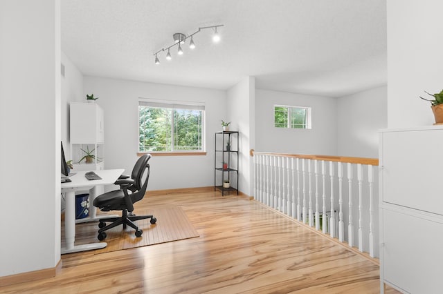 14939 Pinto Ln, Savage, MN 55378 - office area featuring healthy amount of natural light and wood finished floors
