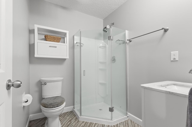 14939 Pinto Ln, Savage, MN 55378 - full bathroom with a stall shower, a textured ceiling, and vanity