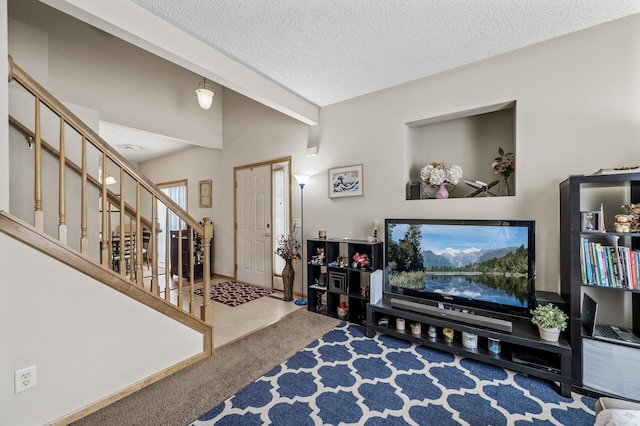 6566 Merrimac Ln N, Maple Grove, MN 55311 - carpeted living room featuring stairs and a textured ceiling