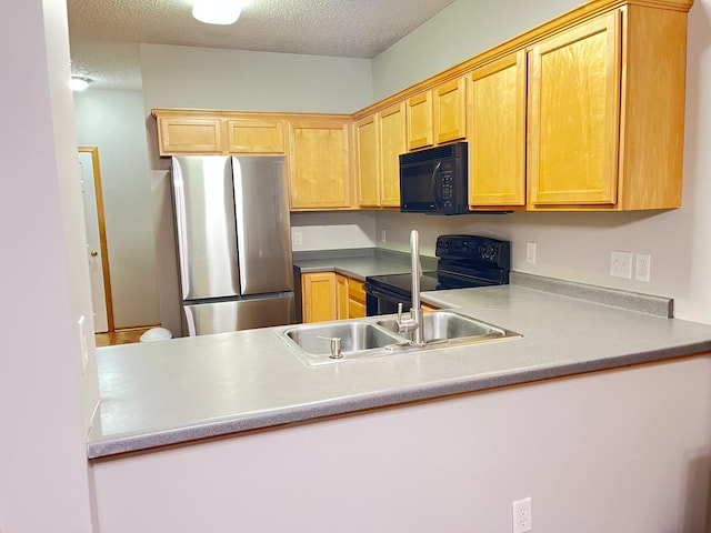 6566 Merrimac Ln N, Maple Grove, MN 55311 - kitchen featuring black appliances, light countertops, a textured ceiling, and light brown cabinets
