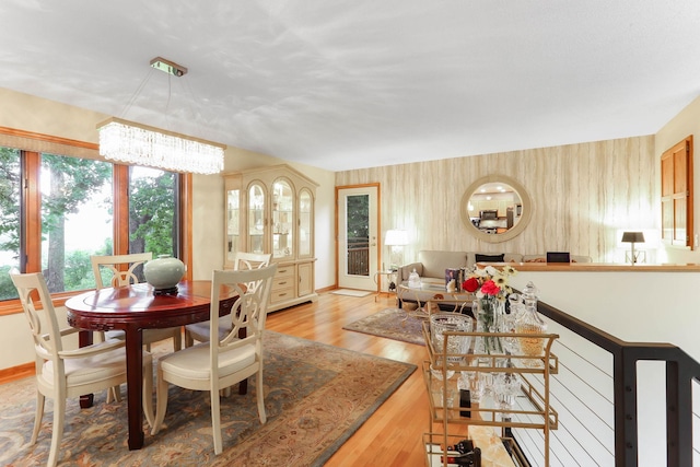 2583 Lost Lake Rd, Mound, MN 55364 - dining space featuring a chandelier and light wood finished floors