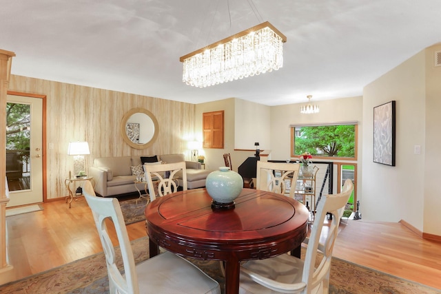 2583 Lost Lake Rd, Mound, MN 55364 - dining room with a chandelier and light wood-style floors