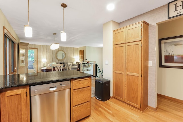 2583 Lost Lake Rd, Mound, MN 55364 - kitchen with stainless steel dishwasher, light wood-type flooring, pendant lighting, open floor plan, and dark stone countertops