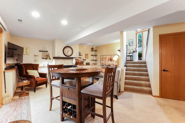 2583 Lost Lake Rd, Mound, MN 55364 - dining area featuring light colored carpet, stairs, and recessed lighting