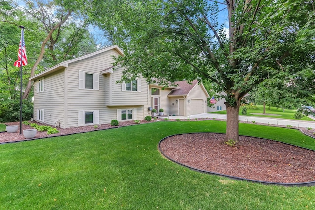 2583 Lost Lake Rd, Mound, MN 55364 - split level home featuring a front yard, driveway, and a garage