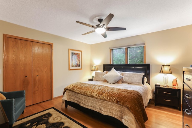 2583 Lost Lake Rd, Mound, MN 55364 - bedroom featuring light wood-style floors, a closet, and a ceiling fan