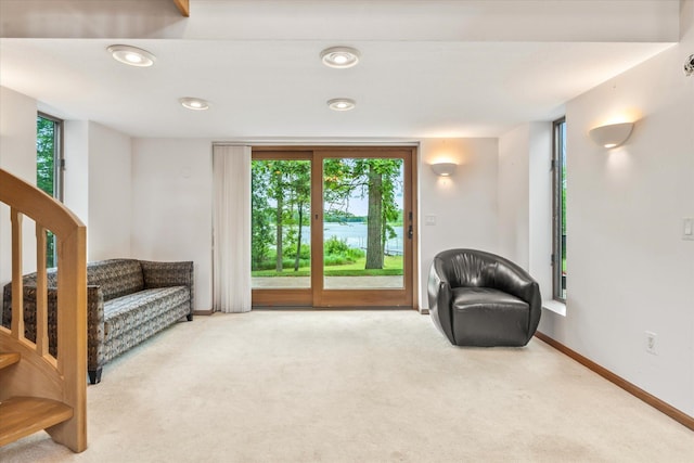 3718 Big Mcgraw Rd, Blaine Twp, WI 54830 - living area featuring stairs, carpet flooring, and recessed lighting