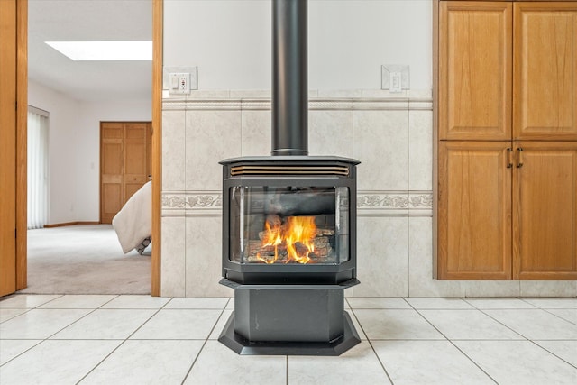 3718 Big Mcgraw Rd, Blaine Twp, WI 54830 - detailed view of a wood stove, a skylight, and carpet flooring