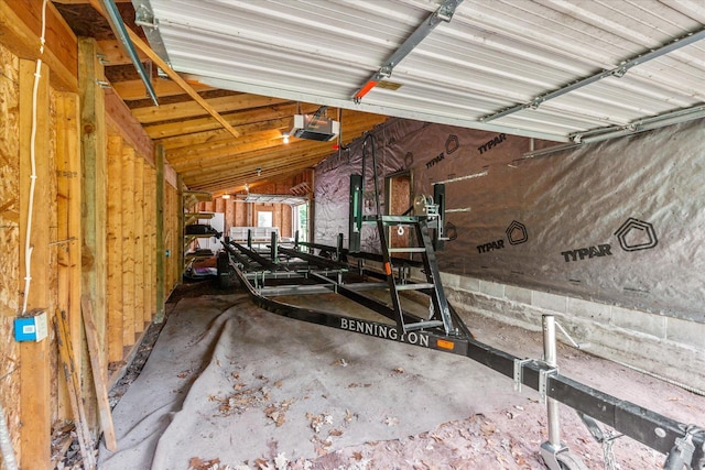 3718 Big Mcgraw Rd, Blaine Twp, WI 54830 - garage featuring a garage door opener