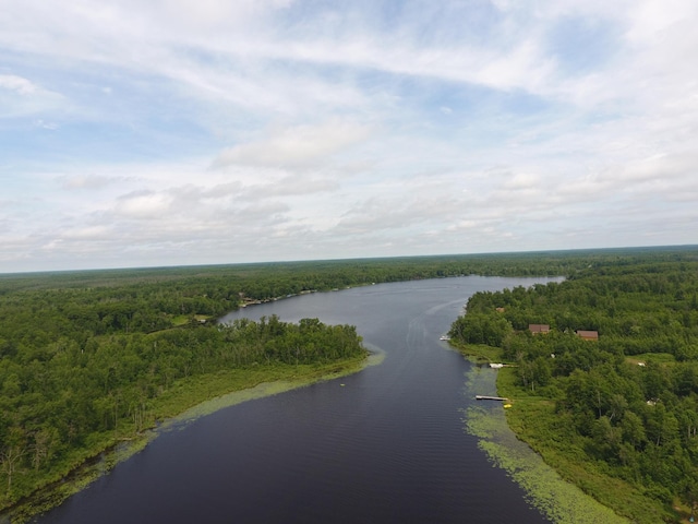 3718 Big Mcgraw Rd, Blaine Twp, WI 54830 - drone / aerial view of a heavily wooded area and a nearby body of water