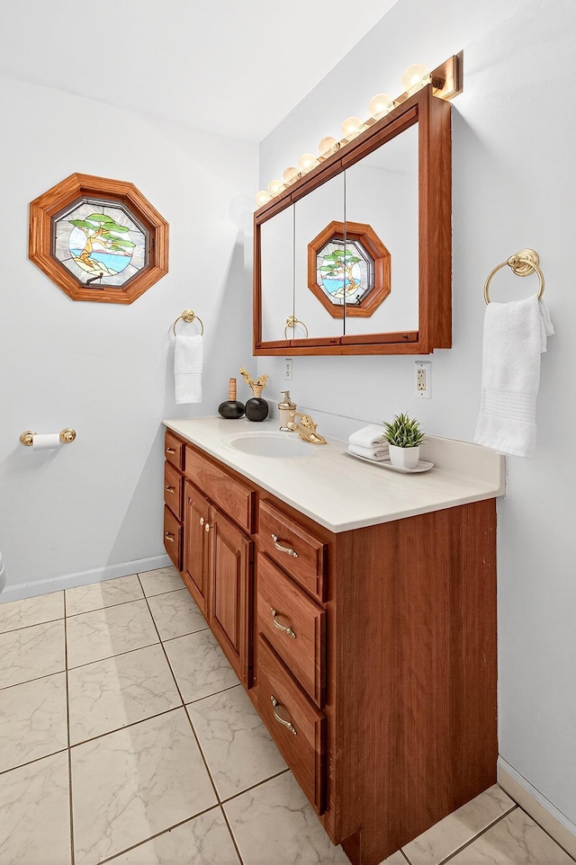 4716 30th Ave S, Minneapolis, MN 55406 - bathroom featuring marble look tiles and vanity
