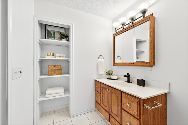 4716 30th Ave S, Minneapolis, MN 55406 - bathroom with vanity, tile patterned flooring, and a textured ceiling