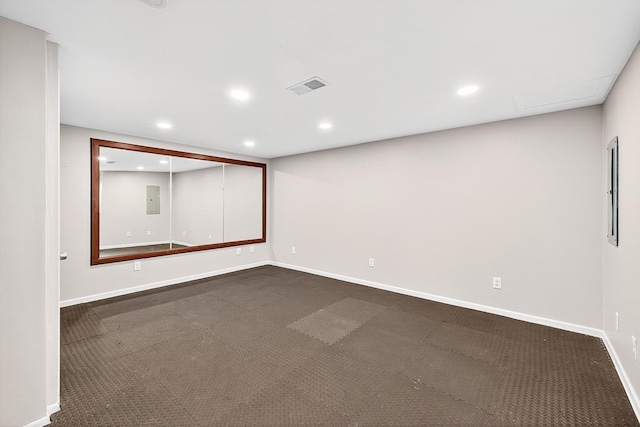 4716 30th Ave S, Minneapolis, MN 55406 - unfurnished room featuring recessed lighting, electric panel, and dark colored carpet