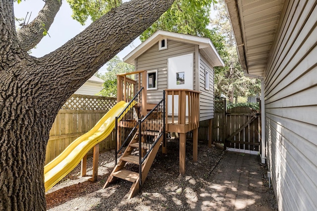4716 30th Ave S, Minneapolis, MN 55406 - view of play area featuring a fenced backyard and a gate