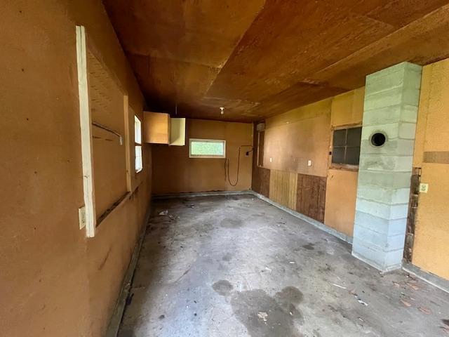 241 S Street W, Amery, WI 54001 - spare room featuring unfinished concrete flooring
