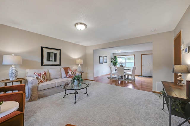 927 Charles Ave, Saint Paul, MN 55104 - carpeted living area featuring baseboards