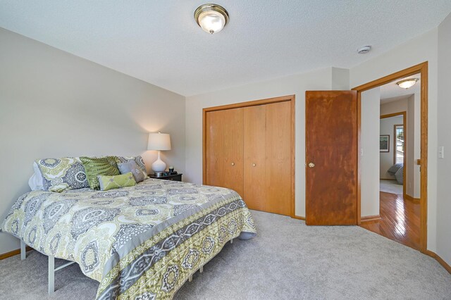 927 Charles Ave, Saint Paul, MN 55104 - carpeted bedroom with a closet and baseboards