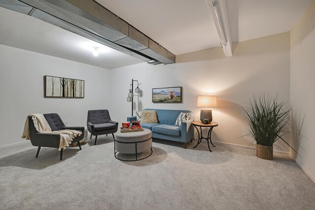 927 Charles Ave, Saint Paul, MN 55104 - carpeted living area featuring baseboards and beam ceiling