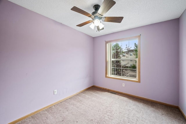 1011 6th Ave NE, Buffalo, MN 55313 - carpeted empty room with ceiling fan and a textured ceiling