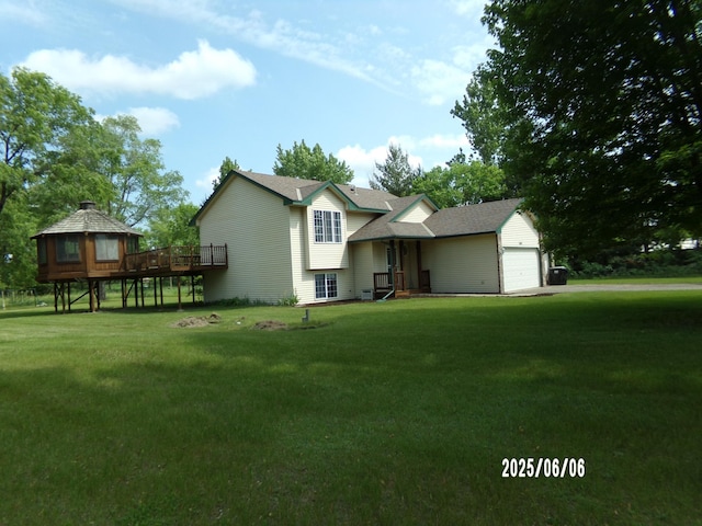 1541 282nd Ln NW, Isanti Twp, MN 55040 - view of front of house with a front lawn and a wooden deck