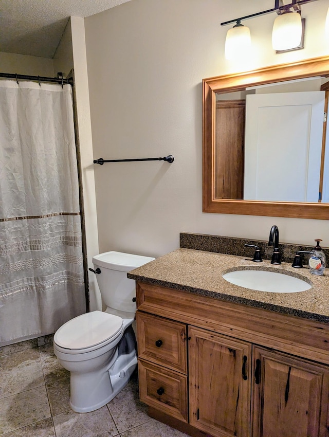 1541 282nd Ln NW, Isanti Twp, MN 55040 - bathroom featuring vanity, tile patterned floors, and a textured ceiling