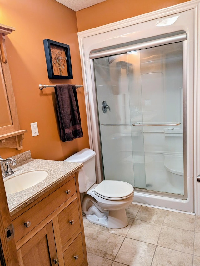 1541 282nd Ln NW, Isanti Twp, MN 55040 - bathroom featuring vanity, a stall shower, and tile patterned flooring