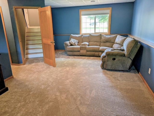 1541 282nd Ln NW, Isanti Twp, MN 55040 - carpeted living room featuring a paneled ceiling and stairs