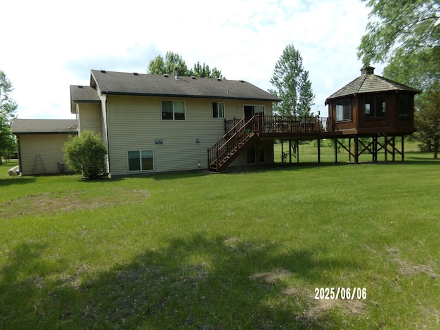 1541 282nd Ln NW, Isanti Twp, MN 55040 - rear view of house with stairs, a wooden deck, a yard, and a gazebo