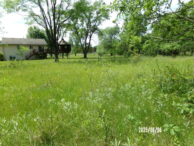 1541 282nd Ln NW, Isanti Twp, MN 55040 - view of yard featuring stairs and a deck